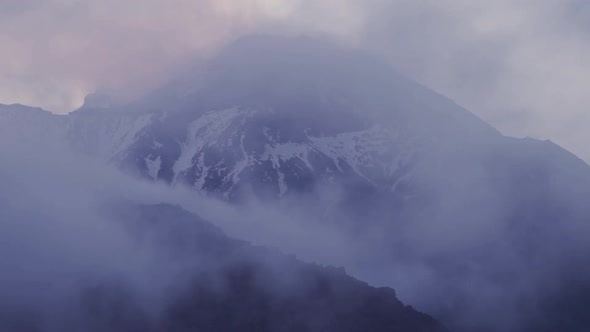 Time Lapse of Clouds Moving Through the Forests and Mountains