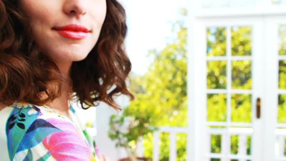 Smiling woman standing in restaurant