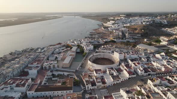 Aerial view Ayamonte Bullring downtown with Guadiana river and Portugal Background