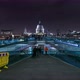 People Crossing the Millennium Bridge at Night - VideoHive Item for Sale