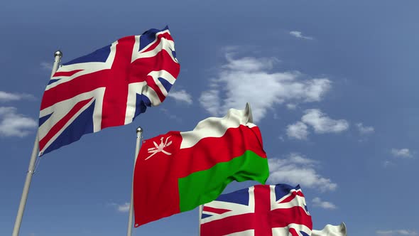 Flags of Oman and the UK at International Meeting