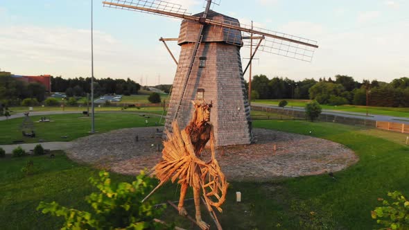 Aerial Circle Around Handmade Figure In Lithuania Countryside