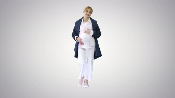 Pregnant Woman Feeling Birth Contractions on Gradient Background.
