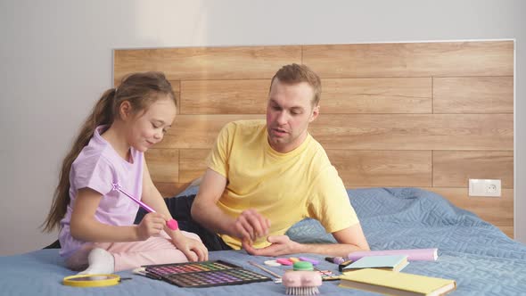 Little Cute Daughter Doing Makeup to Her Father