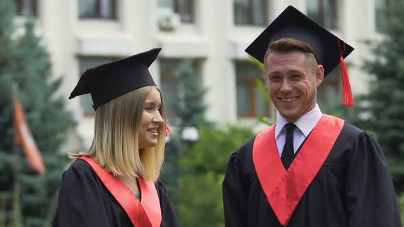 Male and Female Students Graduating From University, Happy Friends Talking