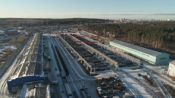 Aerial view of big Round metal pipes in Metal warehouse. 13