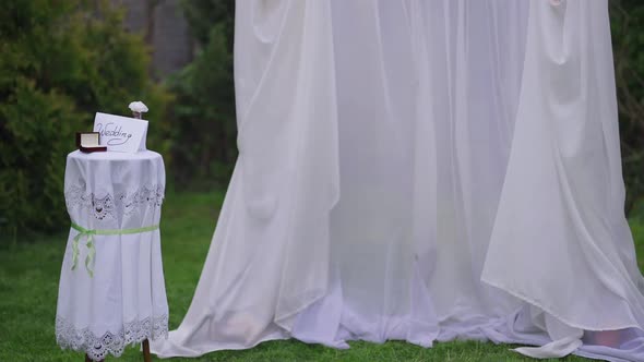 White Wedding Altar Outdoors in Spring Summer Garden with No People