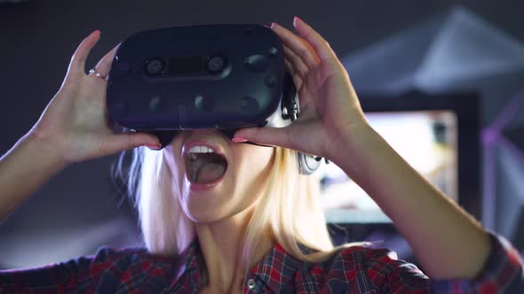Modern Interactive Technologies, Female Puts on Virtual Reality Glasses, Exploring the Virtual Space