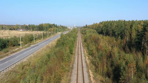 Railway Through Autumn Forest. Aerial View