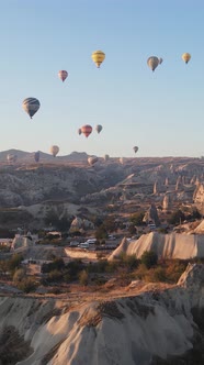 Vertical Video of Hot Air Balloons Flying in the Sky Over Cappadocia Turkey