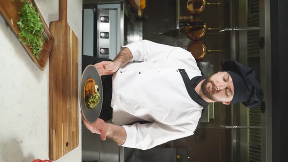 Chef Presents Cooked Breakfast Dish To the Guests