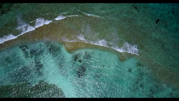 Aerial top down travel of relaxing seashore beach holiday by aqua blue sea with white sand backgroun