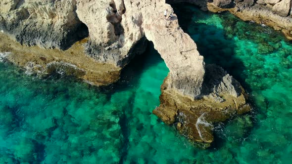 Aerial View of Lovers Bridge on Rocky Shore of Mediterranean, Cyprus