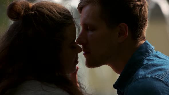 Young Romantic Couple Kissing Close Up