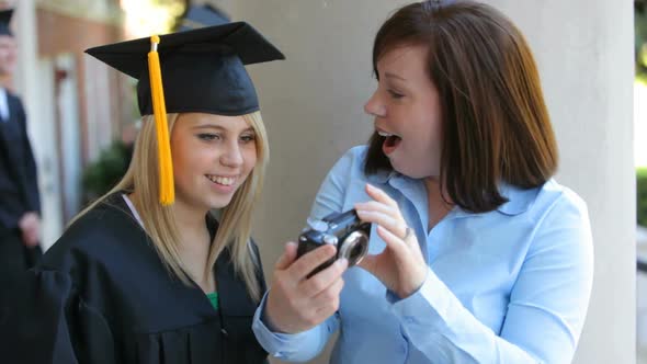 Graduate and mother take self portrait