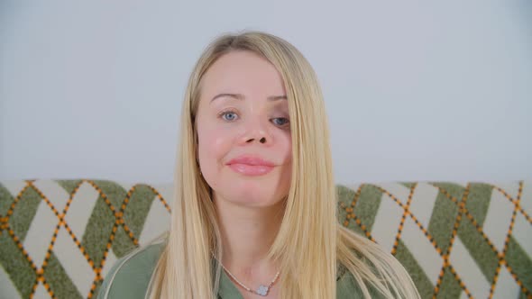 Domestic violence survivor female looking in camera with cheerful smile