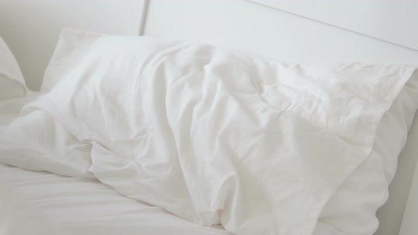 African Woman Laying Down in Bed