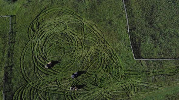 Aerial View of People Riding on Quad Bikes