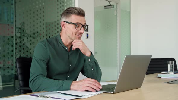 Executive Businessman Using Laptop Having Video Conference Call Virtual Meeting