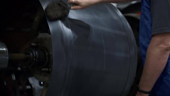 Tire Manufacture Worker Working on Technological Workshop Automative Machine