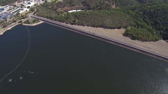 Dam Wall with Cars Moving Drone View