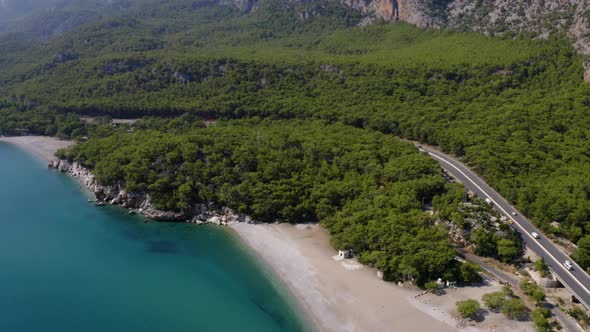 Sea Coastline with Forests Highway Road and Mountains