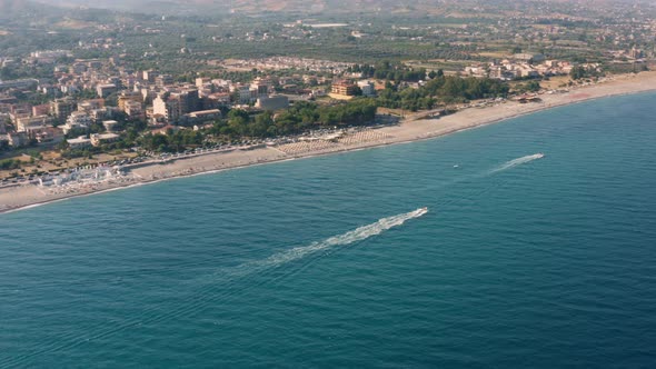 aerial view of motorboat wake in ocean