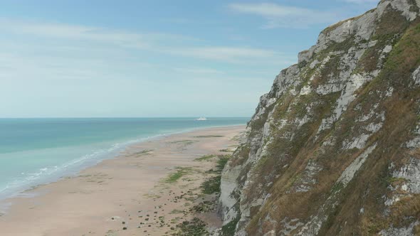 Cruise Ship on Blue Water with Cliff in Foreground, Cap Blanc-Nez, Aerial Forward