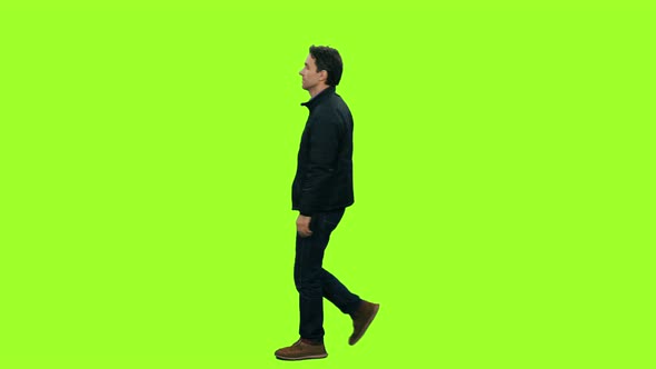 A Man in Casual Wear Walks on Green Background, Chroma Key