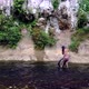 Cute Asian Girl in Bikini Playing on a Rope in the River Thailand - VideoHive Item for Sale