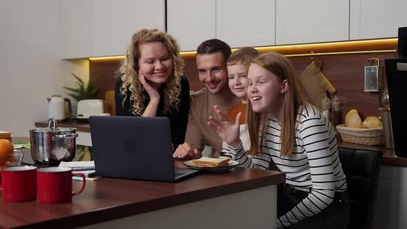 Cheerful Deaf Family with Kids During Video Call