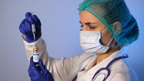 Doctor Preparing for Trials Vaccination Shot