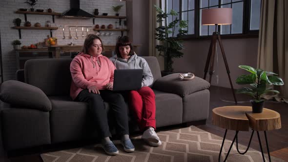 Disabled Girl with Mom During Video Call at Home