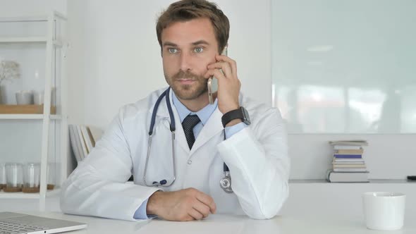 Doctor Talking on Phone
