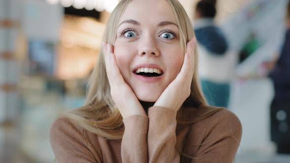 Portrait Blonde Happy Model Girl 20s Woman Winner Surprised Enthusiastic Lady Looking at Camera