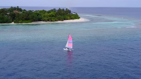 Aerial scenery of tourist beach trip by blue water and sand background