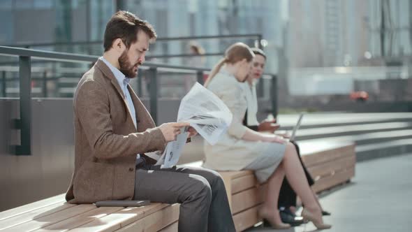 Businessman Reading Newspaper