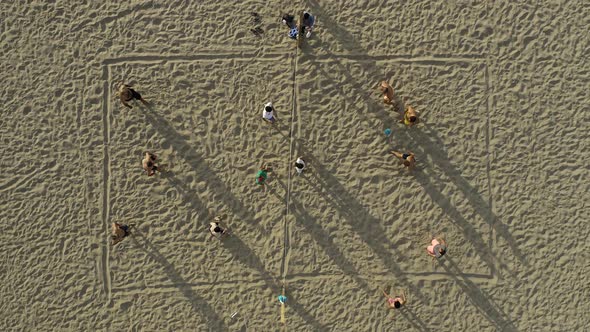 People Playing Volleyball On the Beach