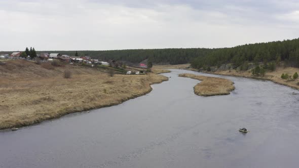 Aerial View of the River with Large Rocks in the Riverbed.