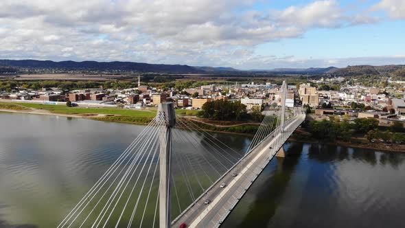 Portsmouth Ohio viewed from Kentucky over the Ohio River with the US Grant Bridge in the foreground.