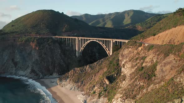 Scenic Bridge at the Pure Nature of Big Sur.  Mountains on Motion Background