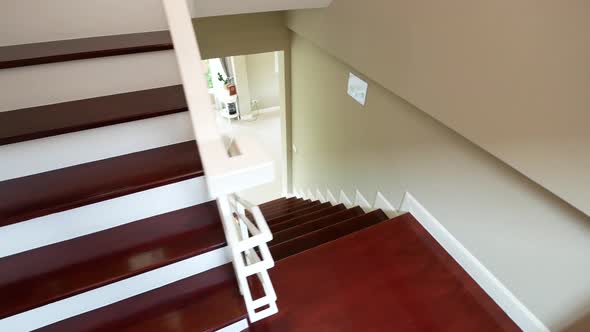 White and Burgundy Wooden Stairscase