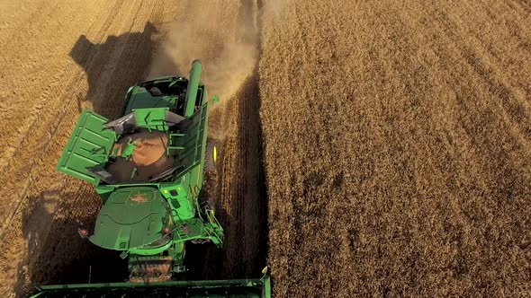 Field, Combines and Cloudy Sky