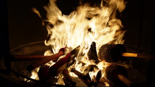 Burning joss stick at furnace pot