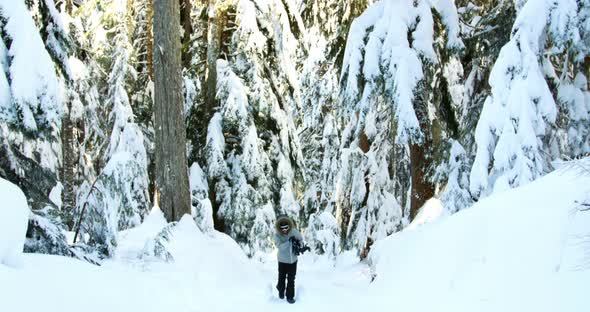 Woman walking with snowboard 4k