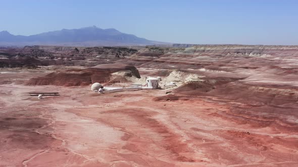 Cinematic Aerial Footage of Mars Research Station in Utah Red Landscape  USA alt