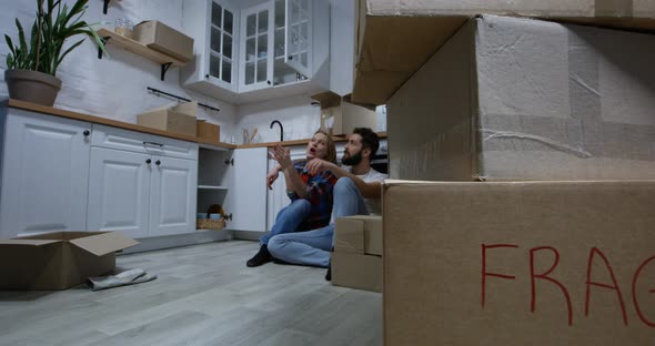 Young Couple Moving in Their New Home