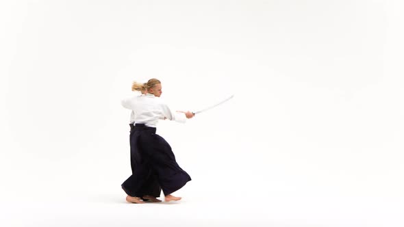 Two Men Showing Aikido Using Katana. Isolated, White. Close Up