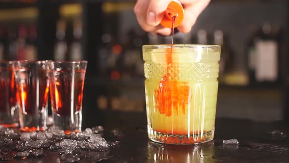 Exotic Fruit Cocktail in Glass Isolated on Blurred Restaurant Background