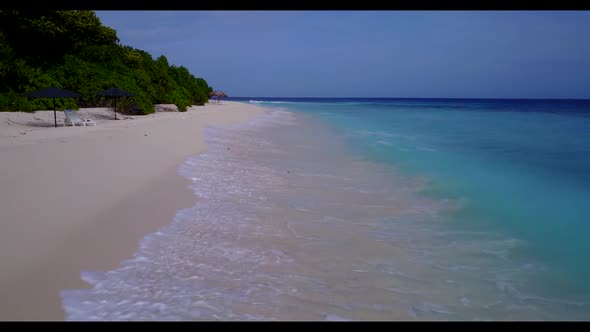 Aerial top view nature of tropical bay beach trip by blue lagoon and bright sand background of a day